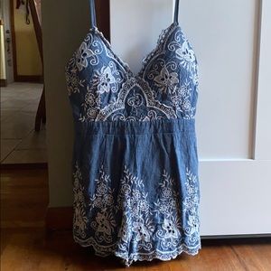 Jean romper with floral print